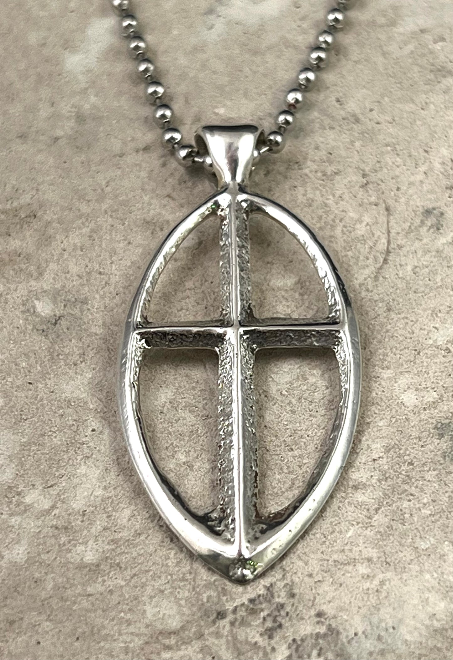 Silver Cross With Oval Circle